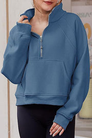 Stylish Patchwork Stand Collar Zippered Loose Pocket Sweatshirt