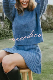 Solid Color Round Neck Puff Sleeve Loose Knit Sweater and Casual Striped Mini Skirt Set